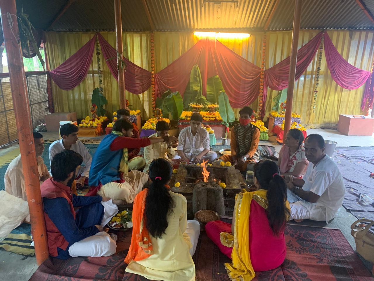 Devotees participating in sacred puja ceremony